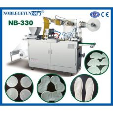 NB-330型暖寶寶包裝機，全自動發(fā)熱貼生產(chǎn)設(shè)備